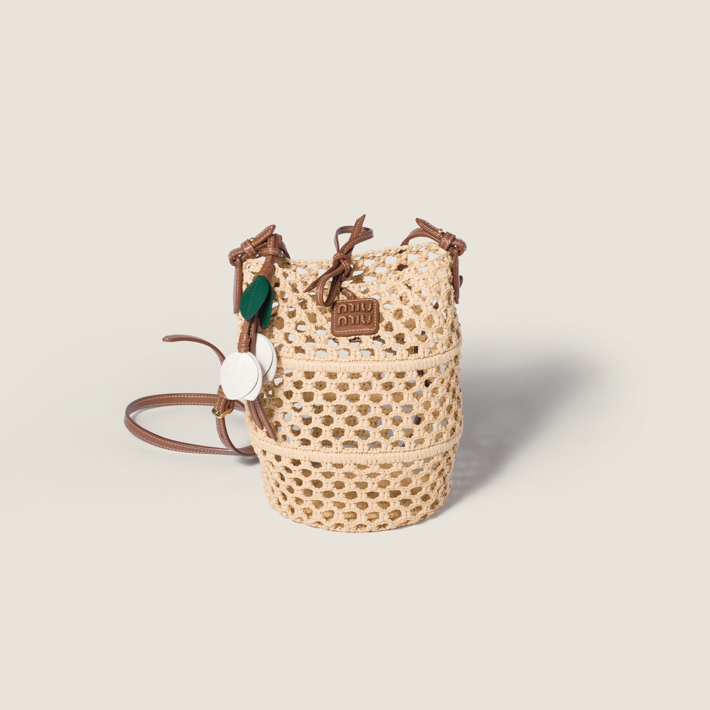 Raffia crochet pouch from Miu Miu - $2,400