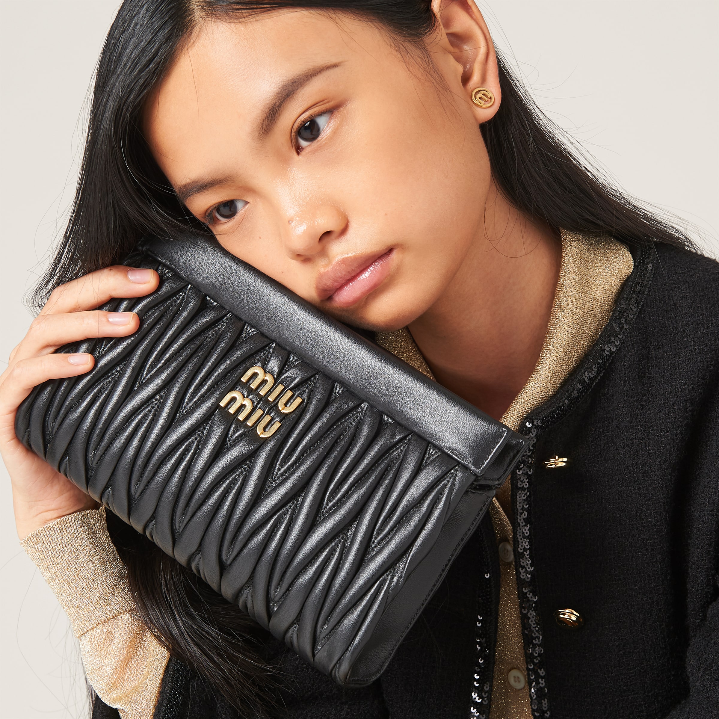 Miu miu matelasse shop clutch