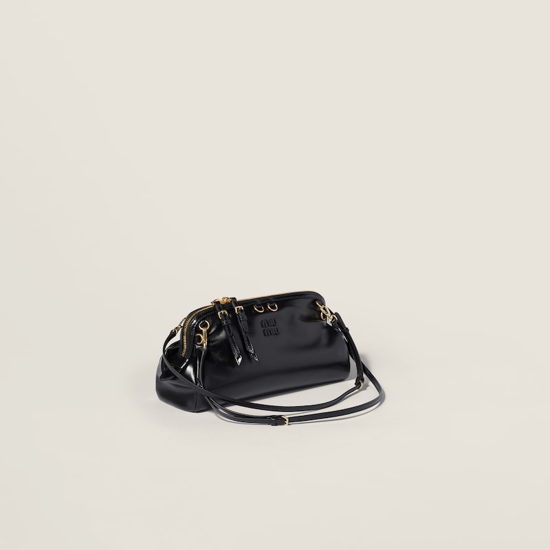 Caprice shiny leather clutch