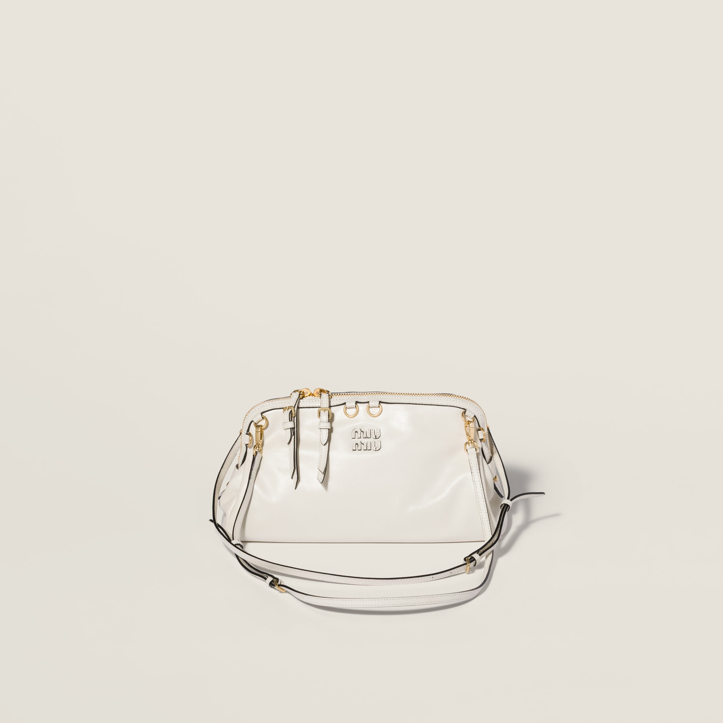 Caprice shiny leather clutch