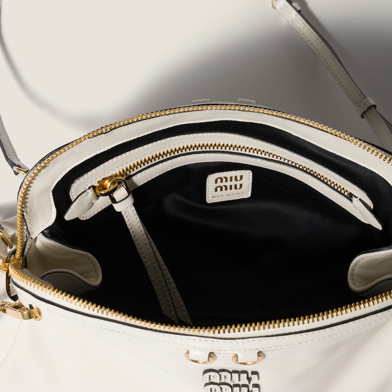 Caprice shiny leather clutch