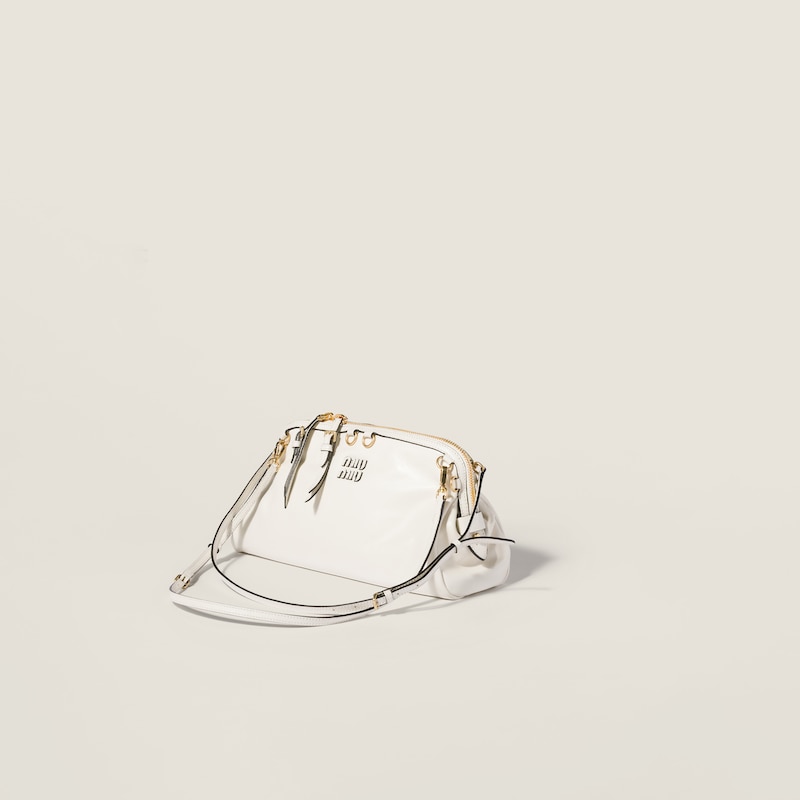 Caprice shiny leather clutch