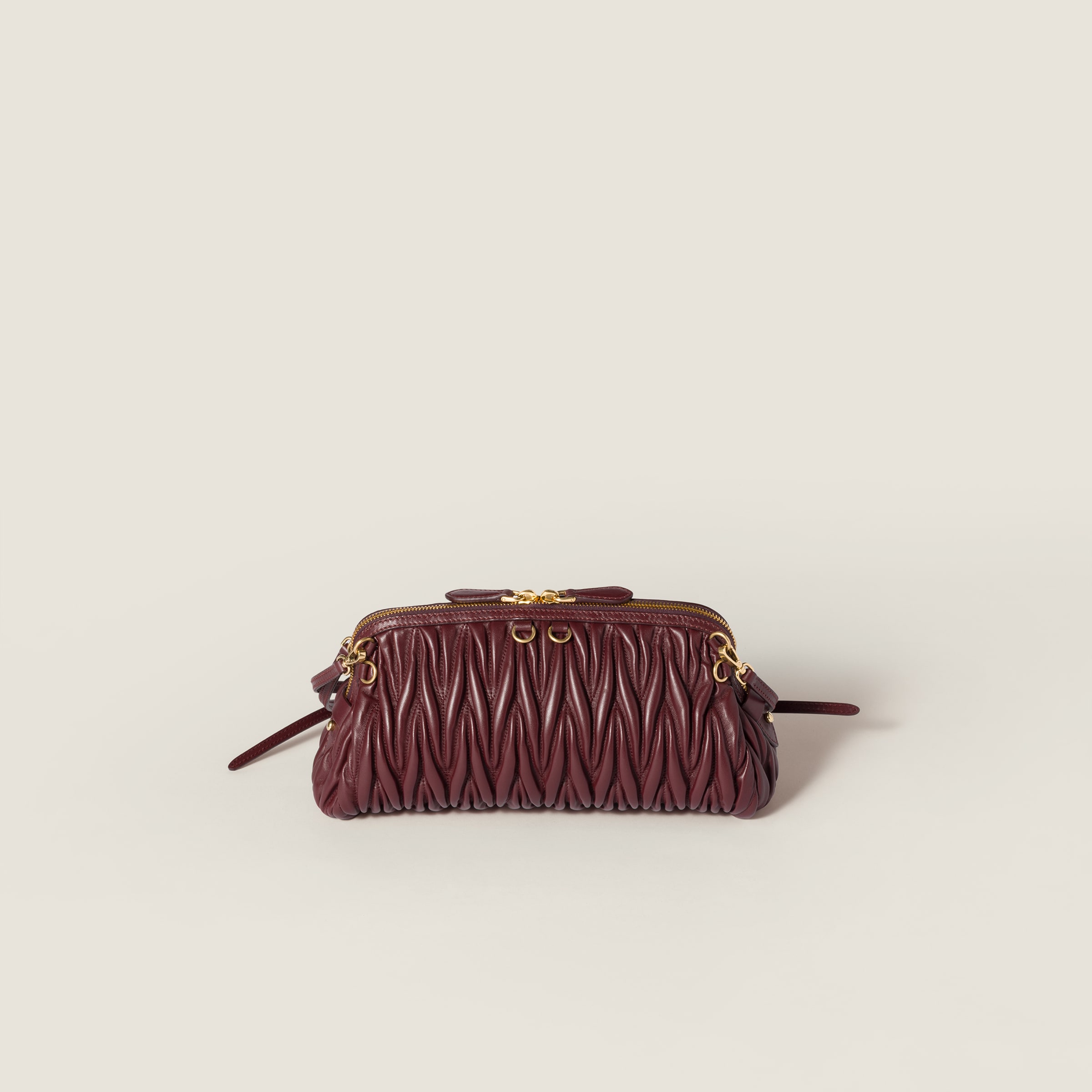 Miu Miu Matelassé Nappa Leather Clutch In Burgundy