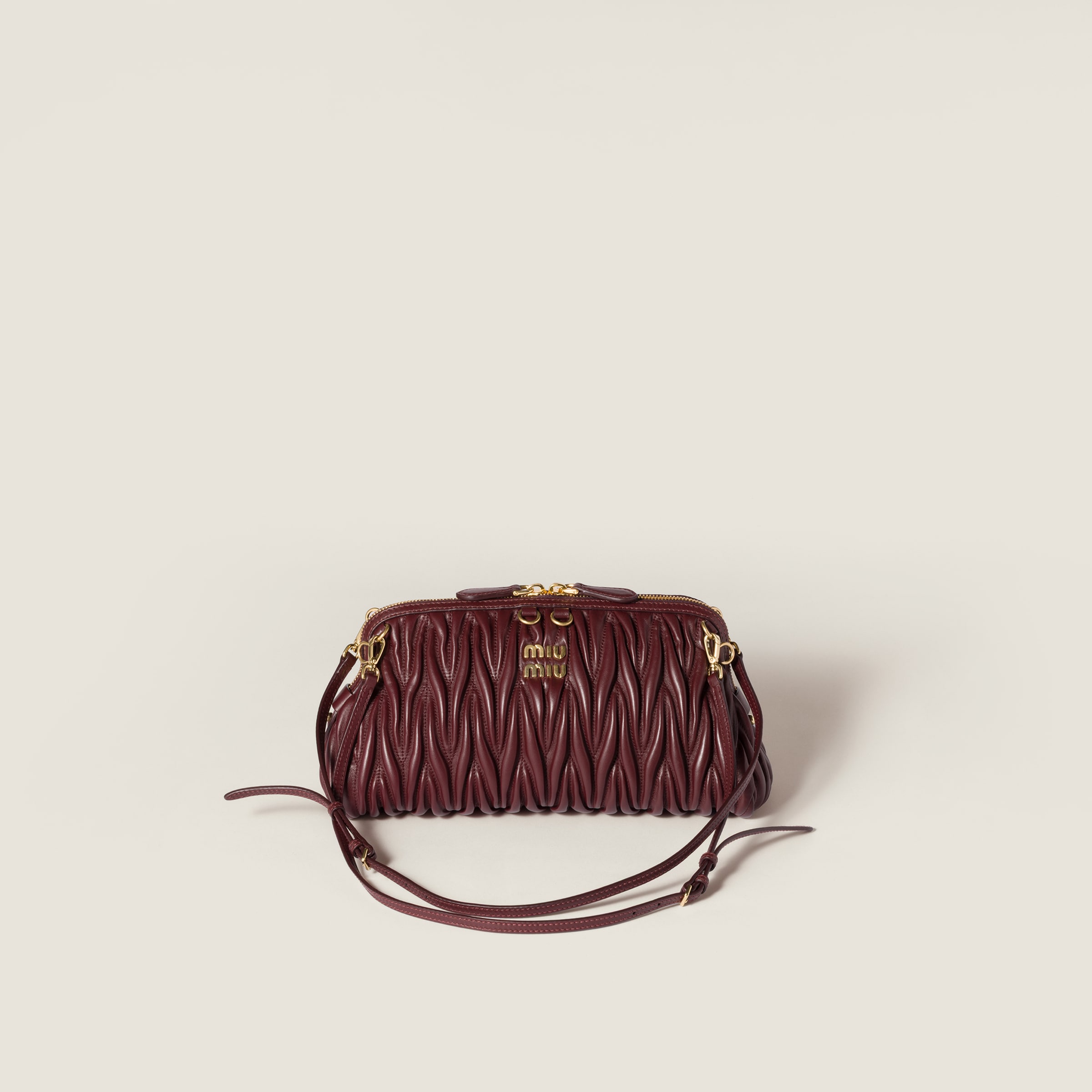 Miu Miu Matelassé Nappa Leather Clutch In Burgundy