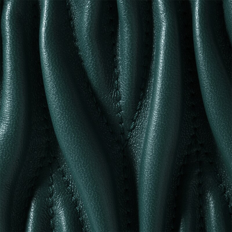 Caprice matelassé nappa leather clutch