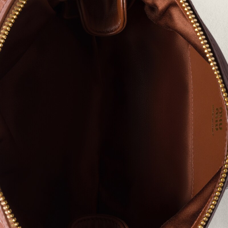 حقيبة كلاتش Caprice مطرزة من جلد نابا