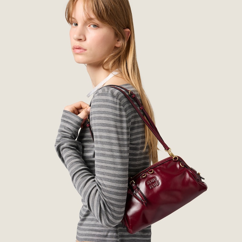 Caprice leather clutch