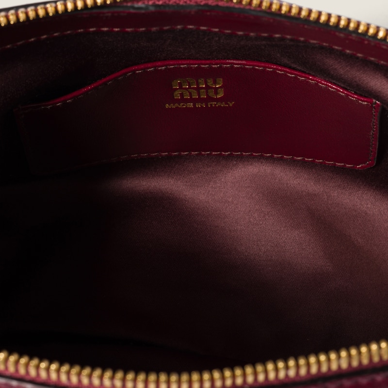 Caprice leather clutch