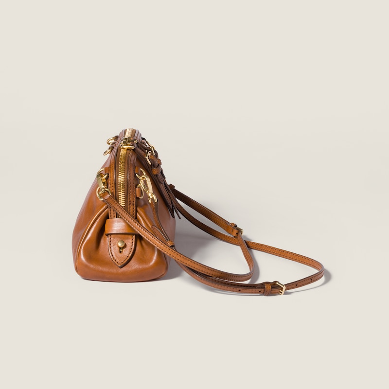 Caprice leather clutch