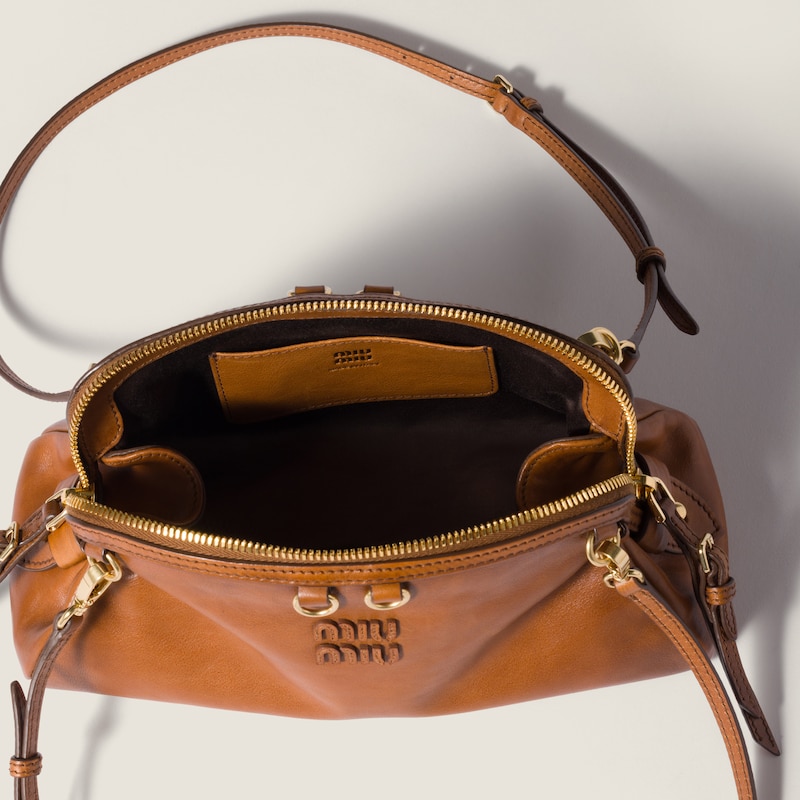 Caprice leather clutch