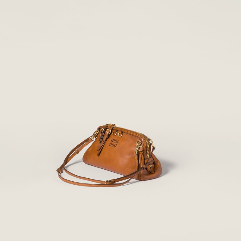 Caprice leather clutch