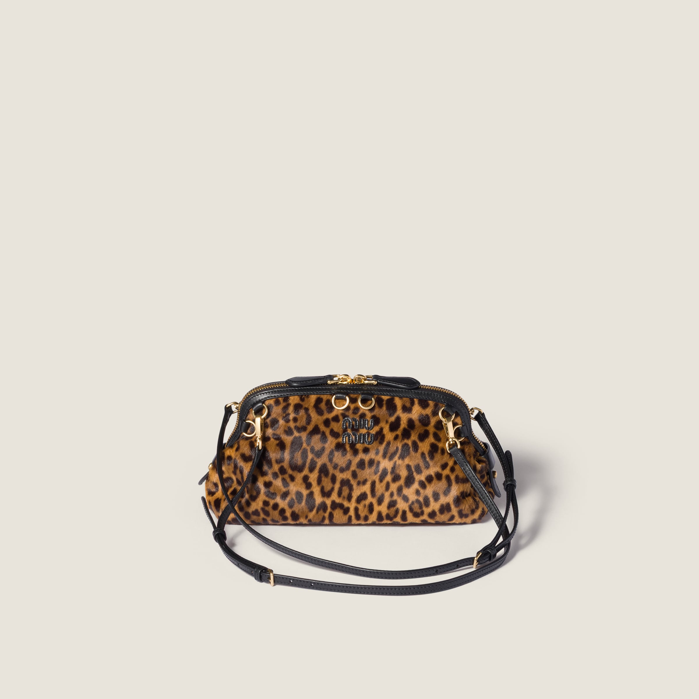 Miu Miu Printed Leather Clutch In Brown