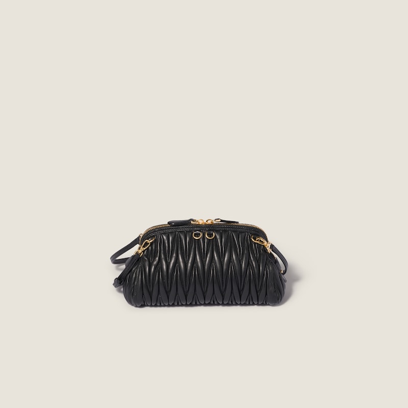 Caprice matelassé nappa leather clutch