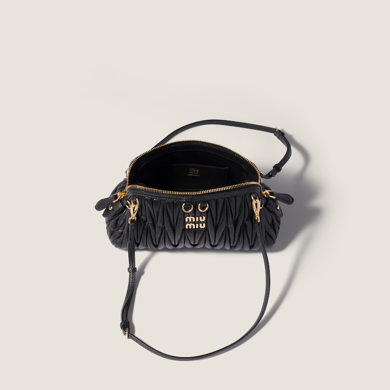Caprice matelassé nappa leather clutch