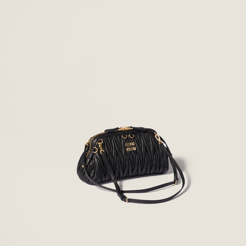 Caprice matelassé nappa leather clutch