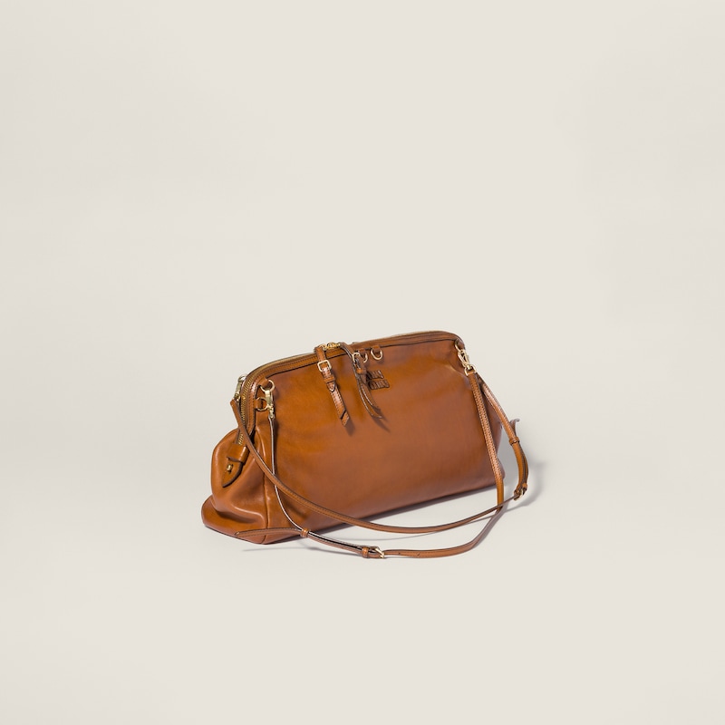 حقيبة كلاتش Caprice من الجلد