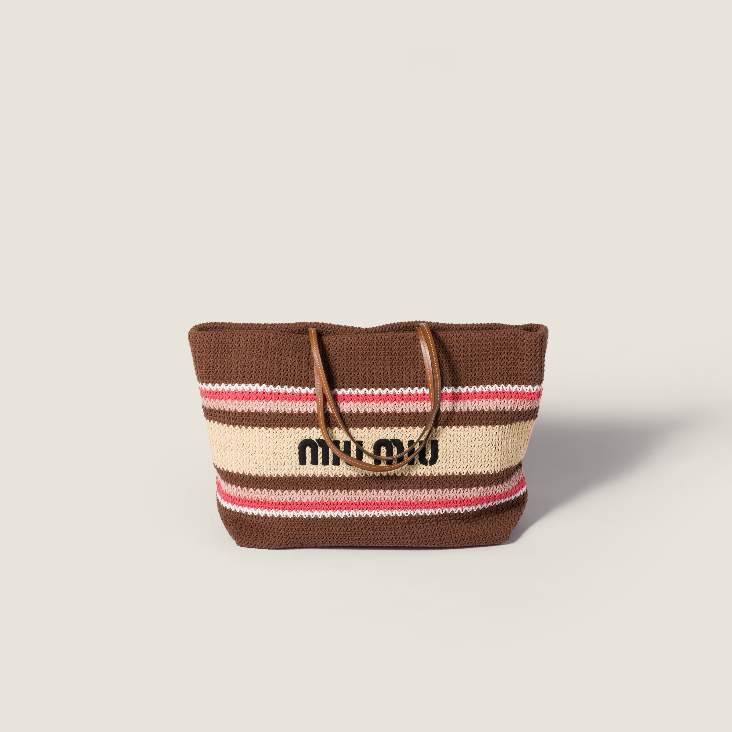Raffia-effect woven tote bag from Miu Miu - $1,990