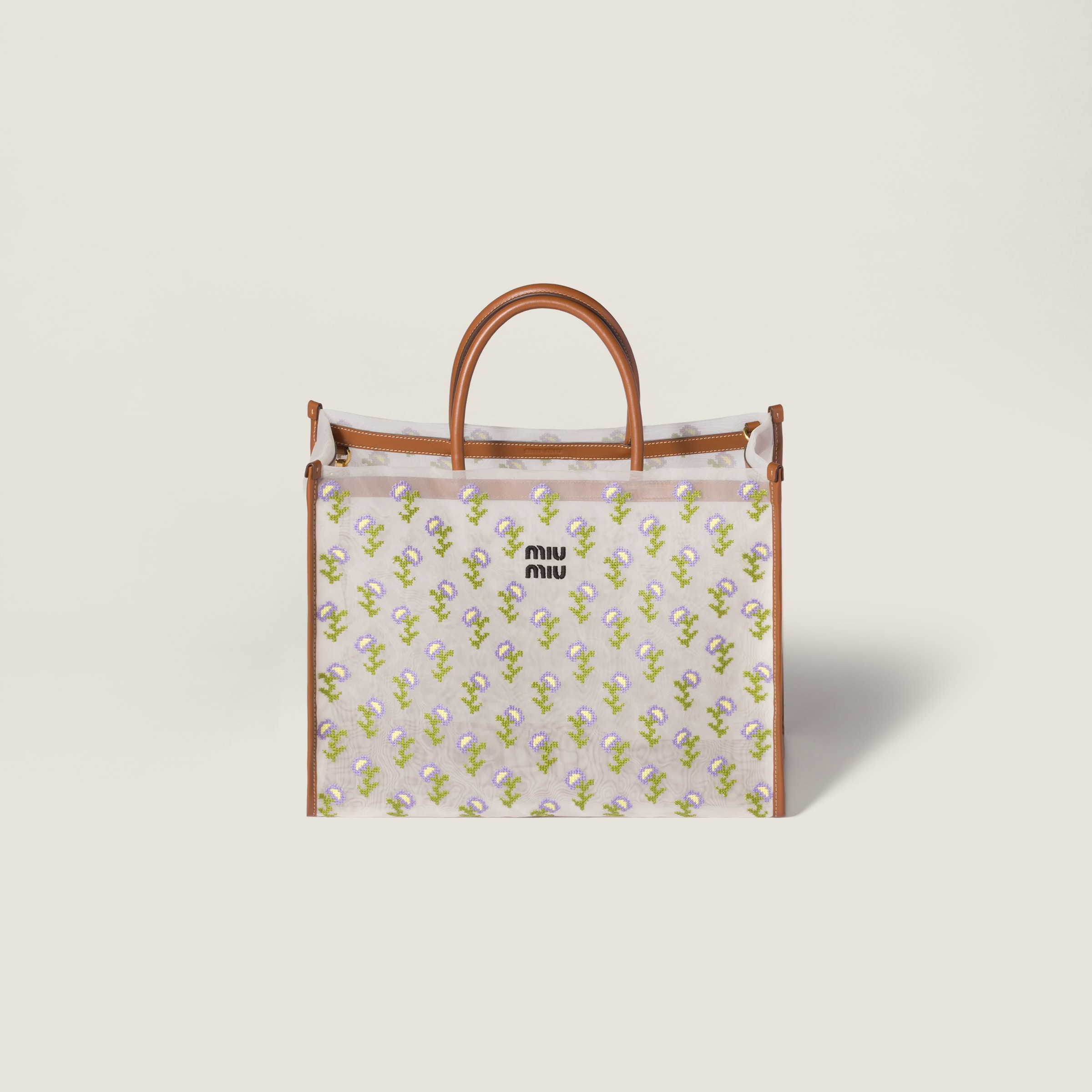 Embroidered mesh shopping bag from Miu Miu - $2,600