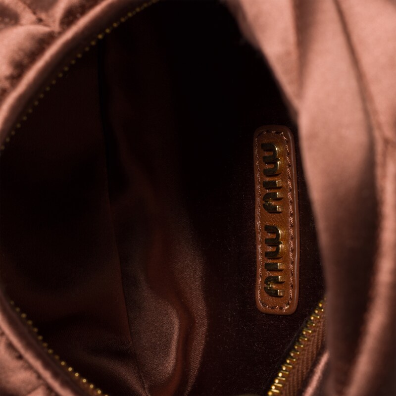 Wander matelassé satin mini-bag