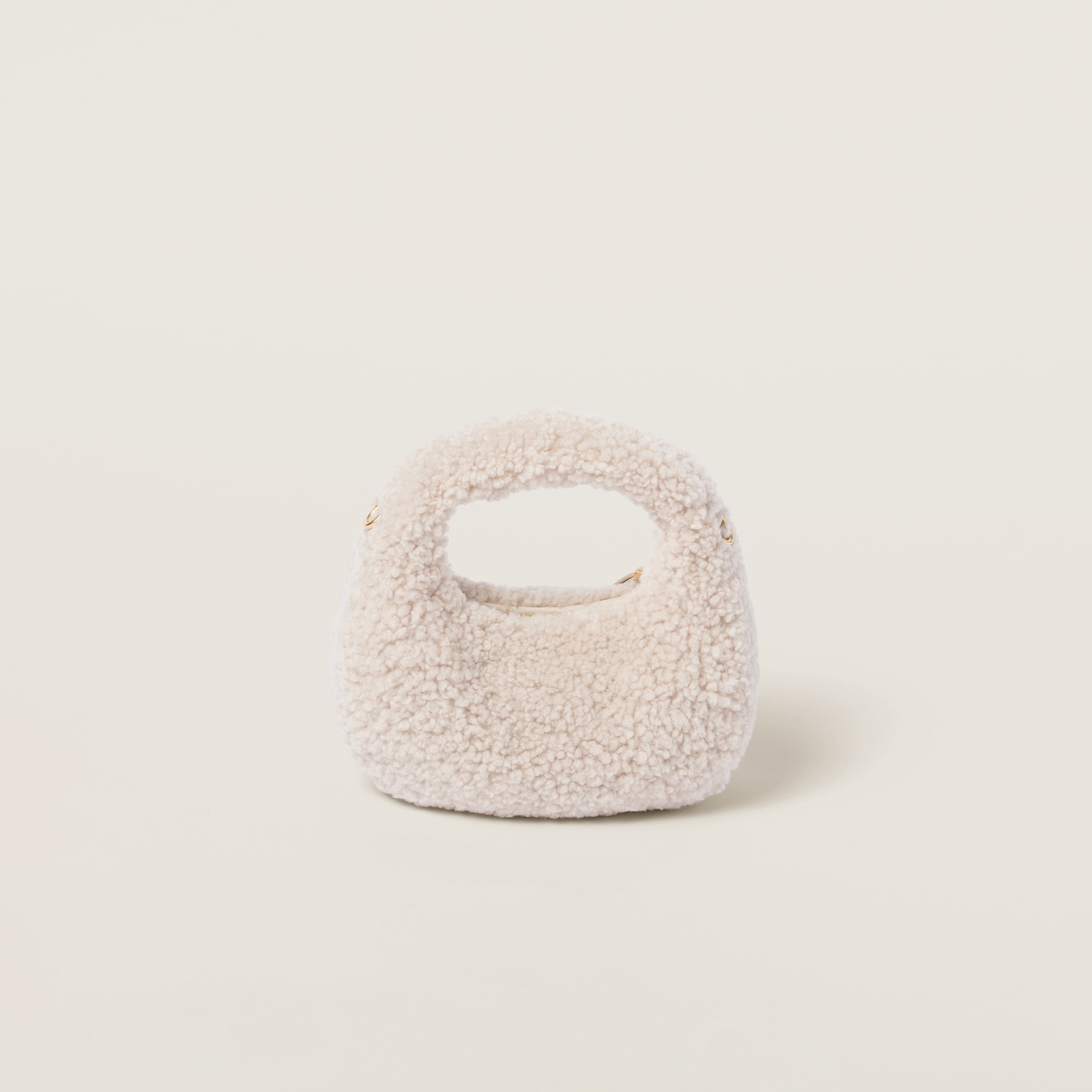 Miu Miu Wander Shearling Hobo Bag With Leather Details In Ivory