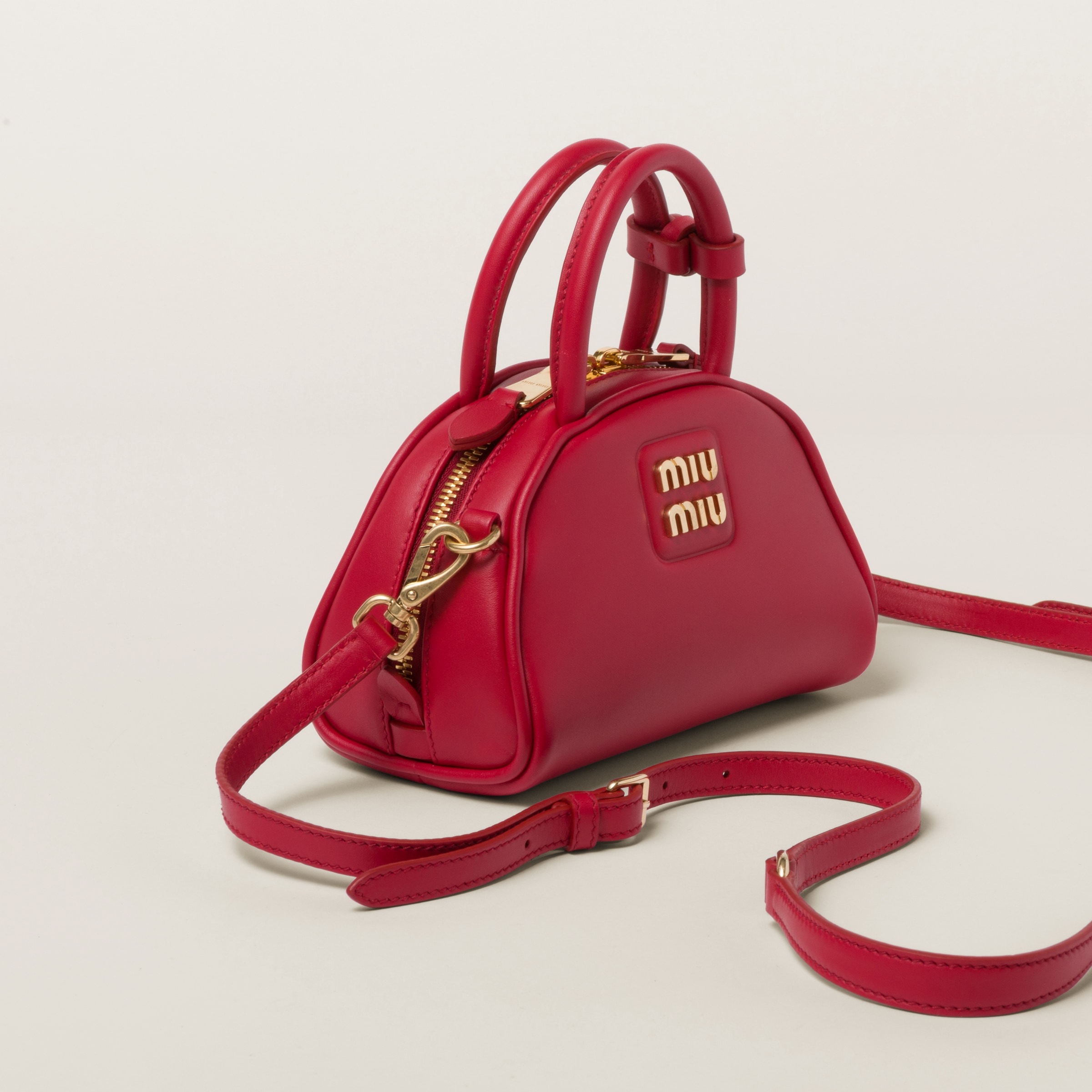 Shop Miumiu Leather Top-handle Bag In Red