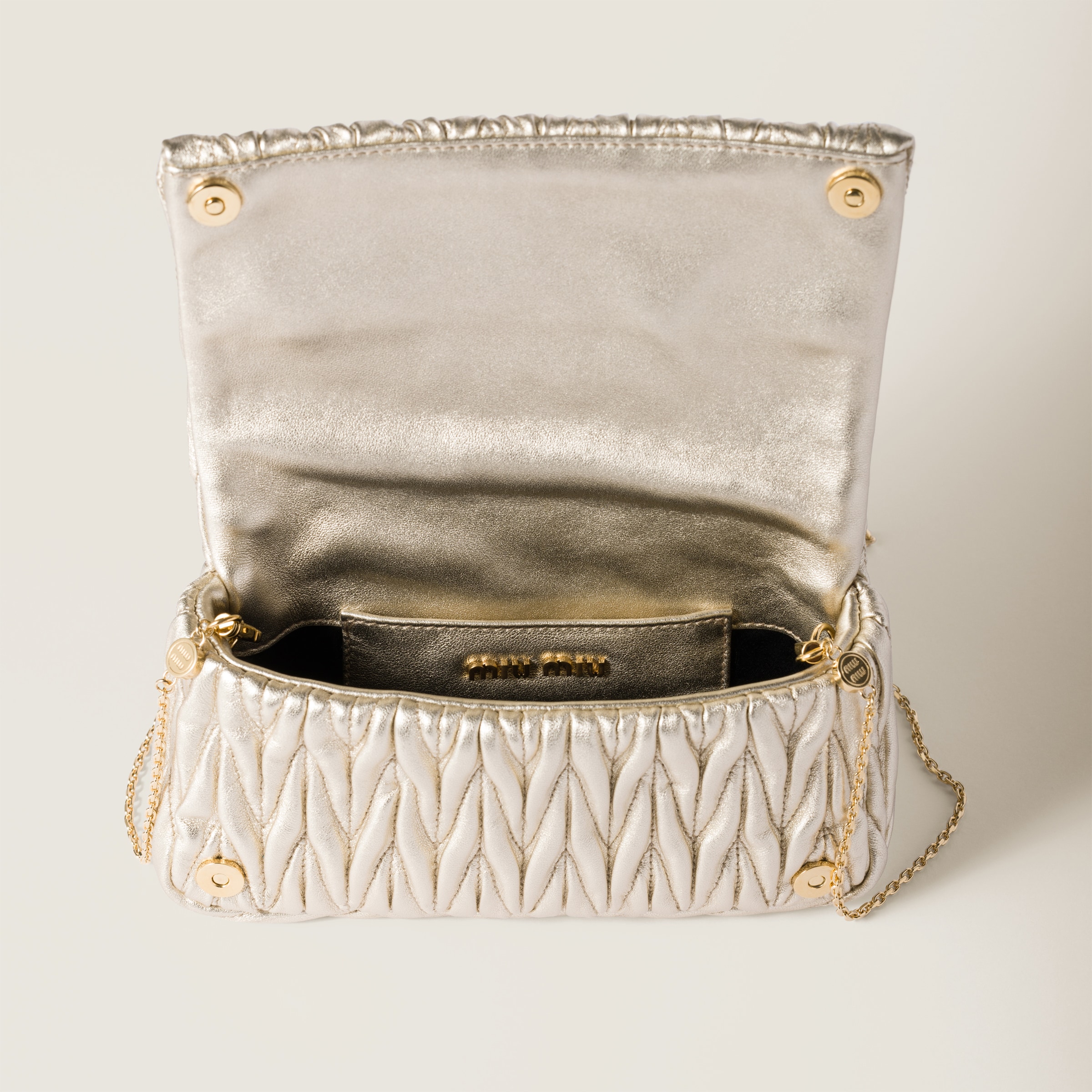 Miu Miu Matelassé Nappa Leather Mini-bag In Pyrite