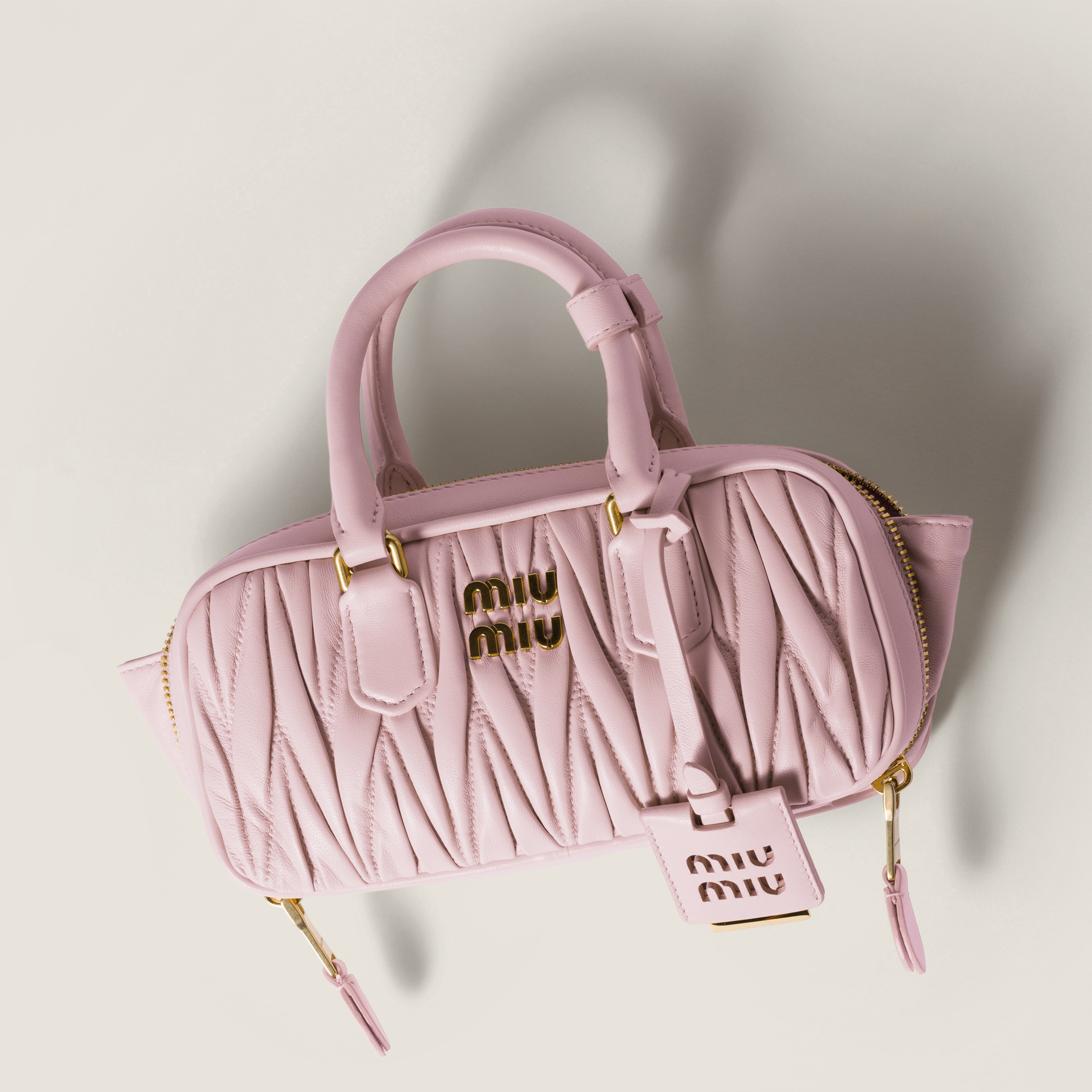 miu miu 薄ピンク リボンバッグ Alabaster Pink Arcadie Matelassé Nappa Leather Mini-bag | Miu Miu