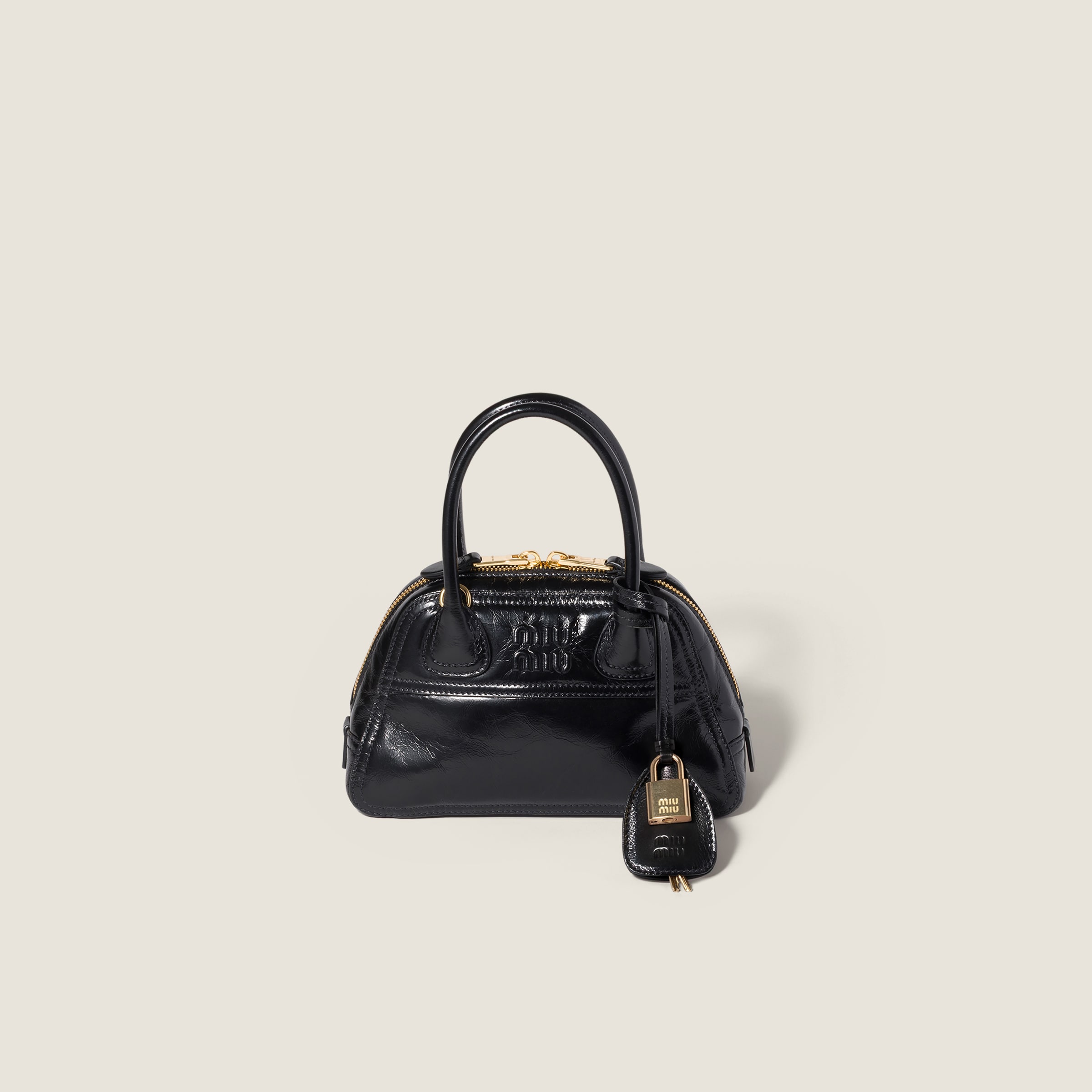 Vivant shiny leather mini-bag by Miu Miu