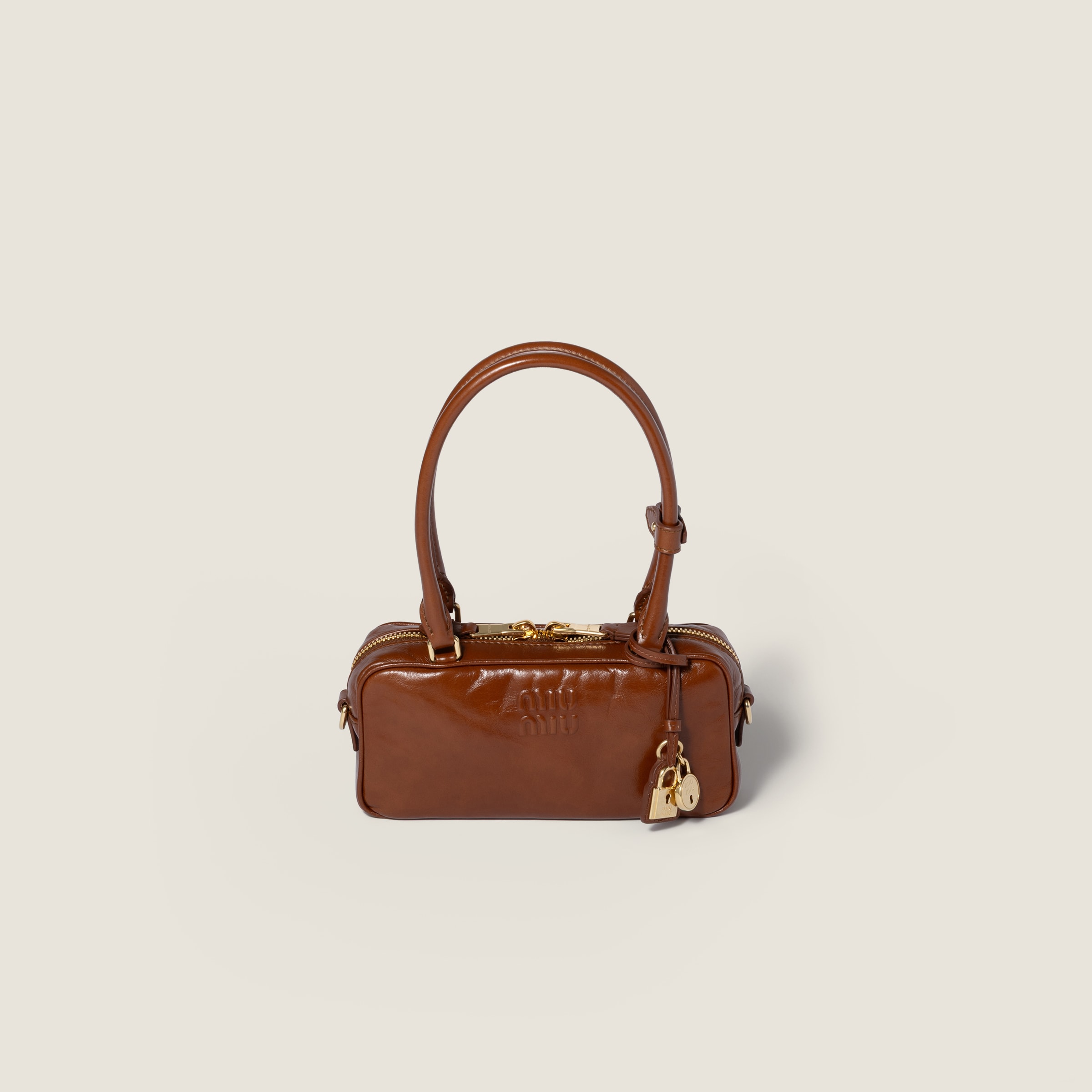 Beau shiny leather mini-bag by Miu Miu