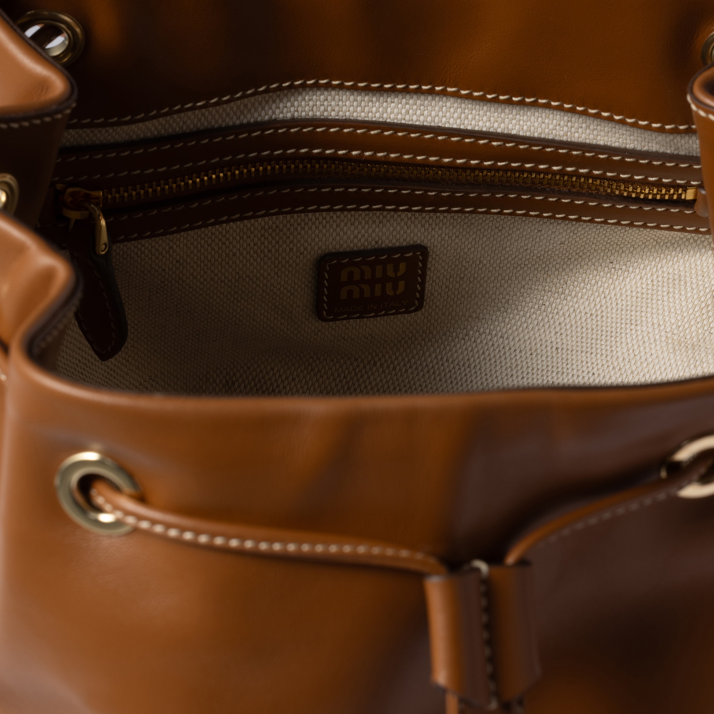 Miu Miu Leather Backpack In Cognac