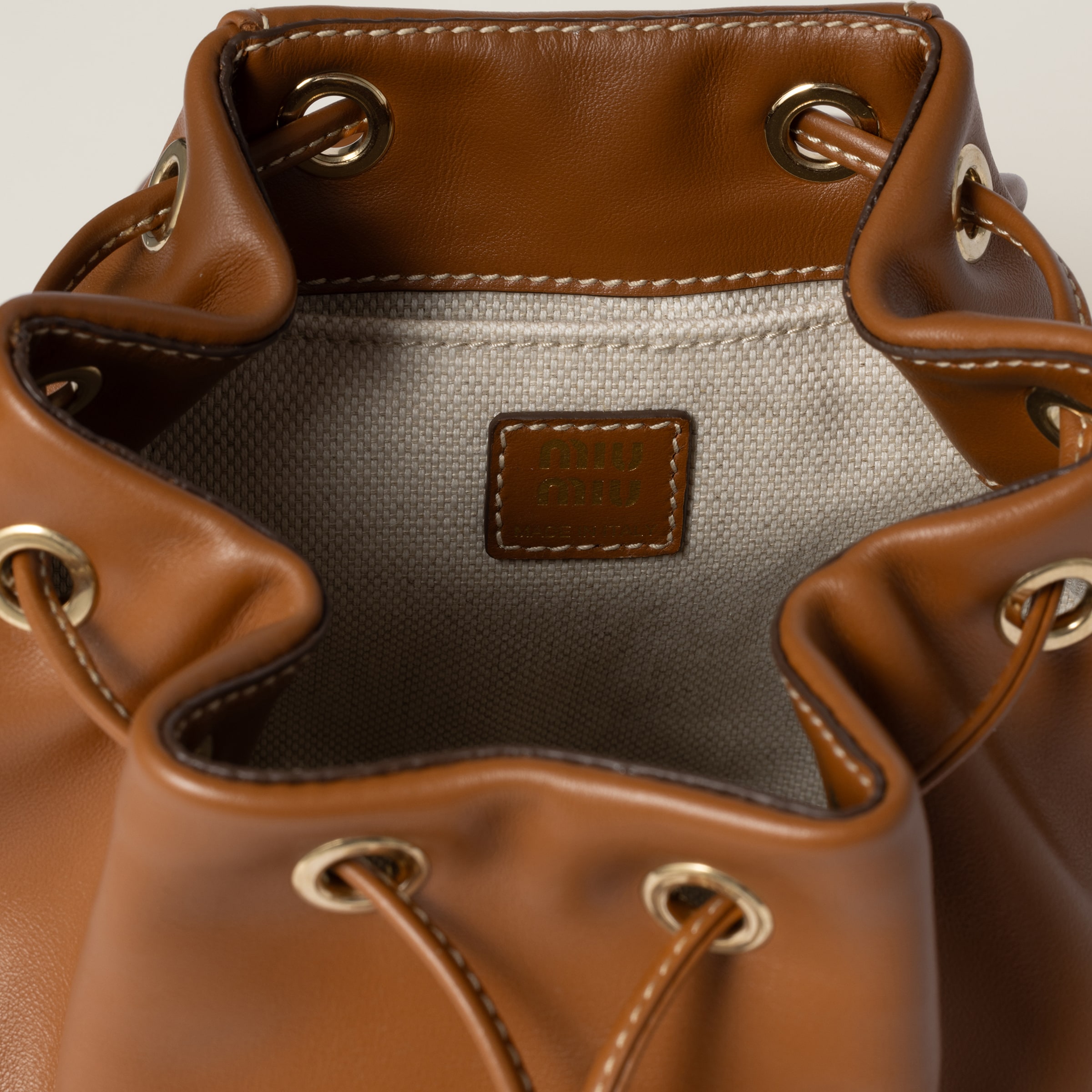 Shop Miu Miu Leather Backpack In Cognac