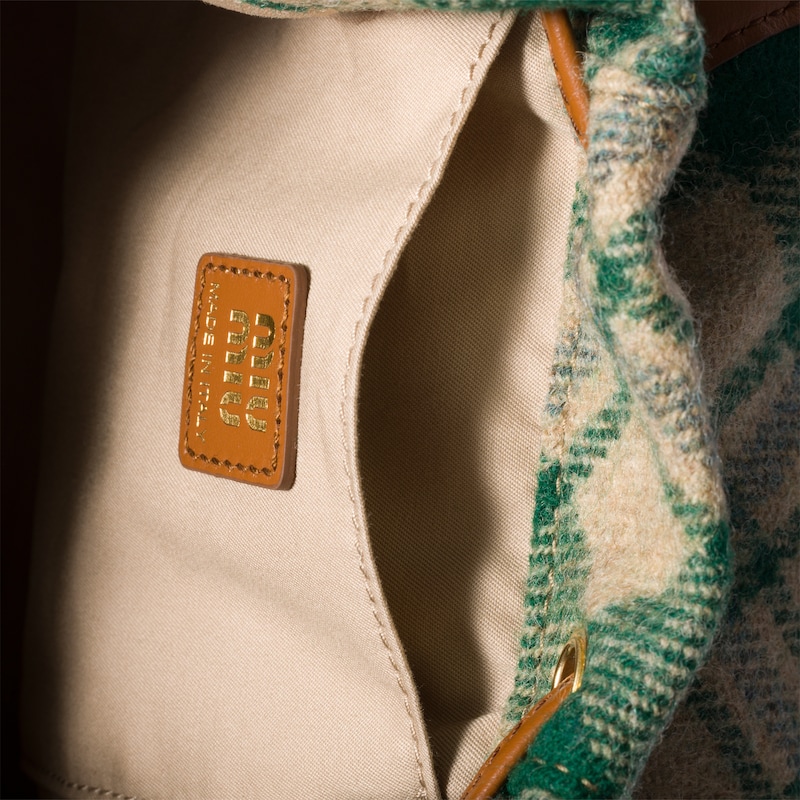 Plaid and leather backpack