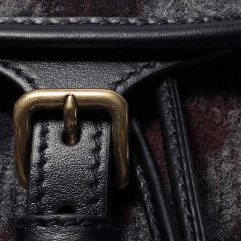 Plaid and leather backpack