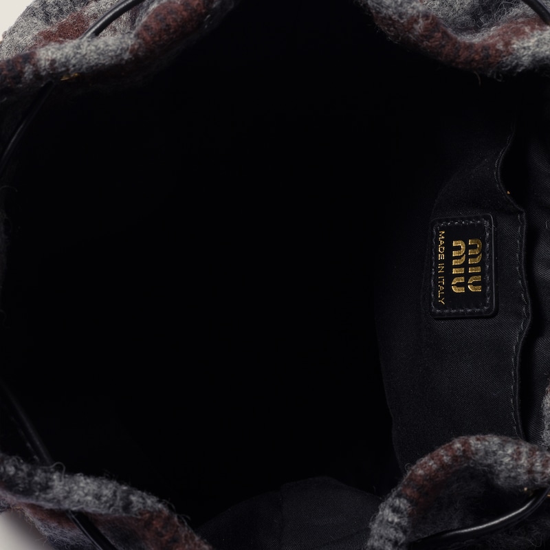 Plaid and leather backpack