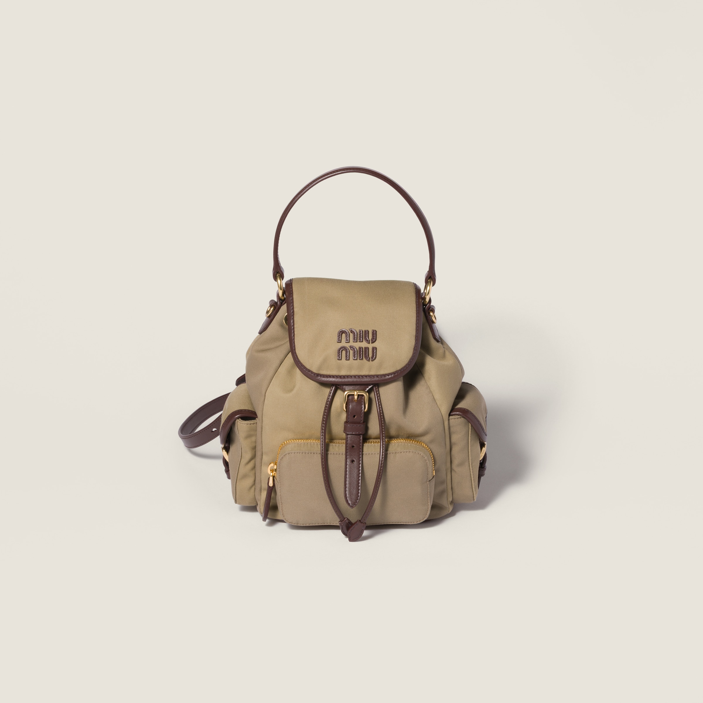 Chino and leather backpack from Miu Miu - $2,450