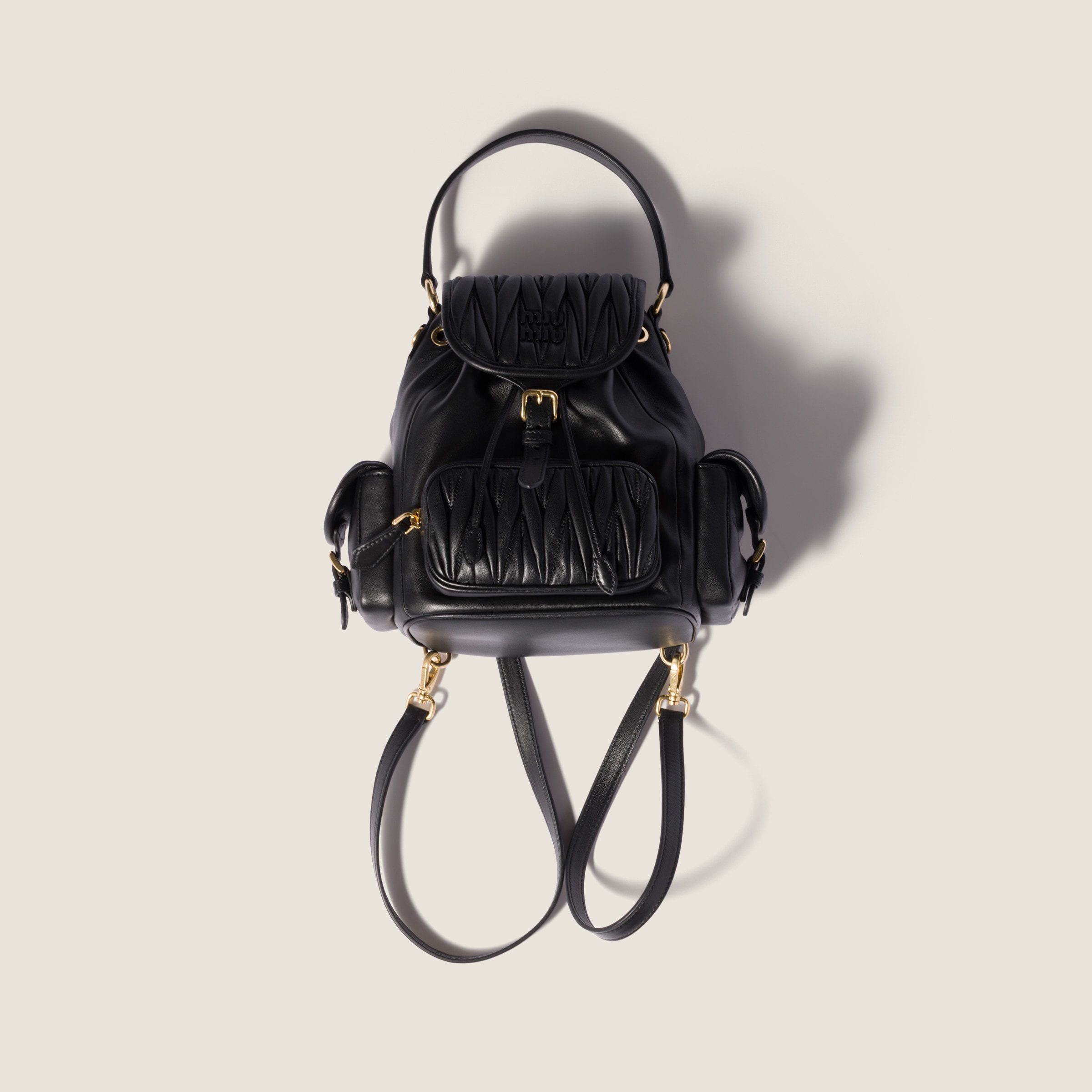 Black Matelassé Nappa Leather Backpack | Miu Miu - Japan
