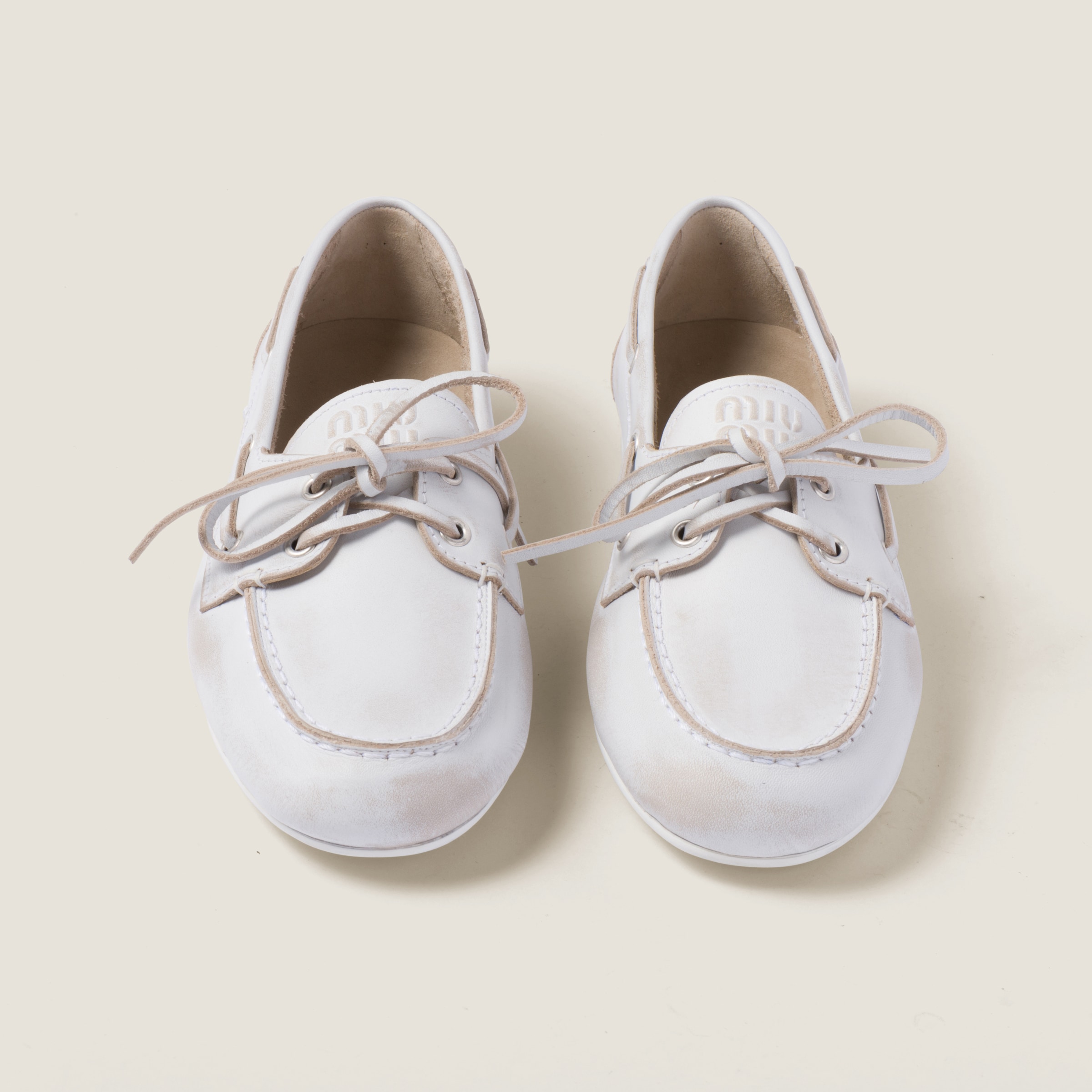 Shop Miumiu Unlined Bleached Leather Loafers In White