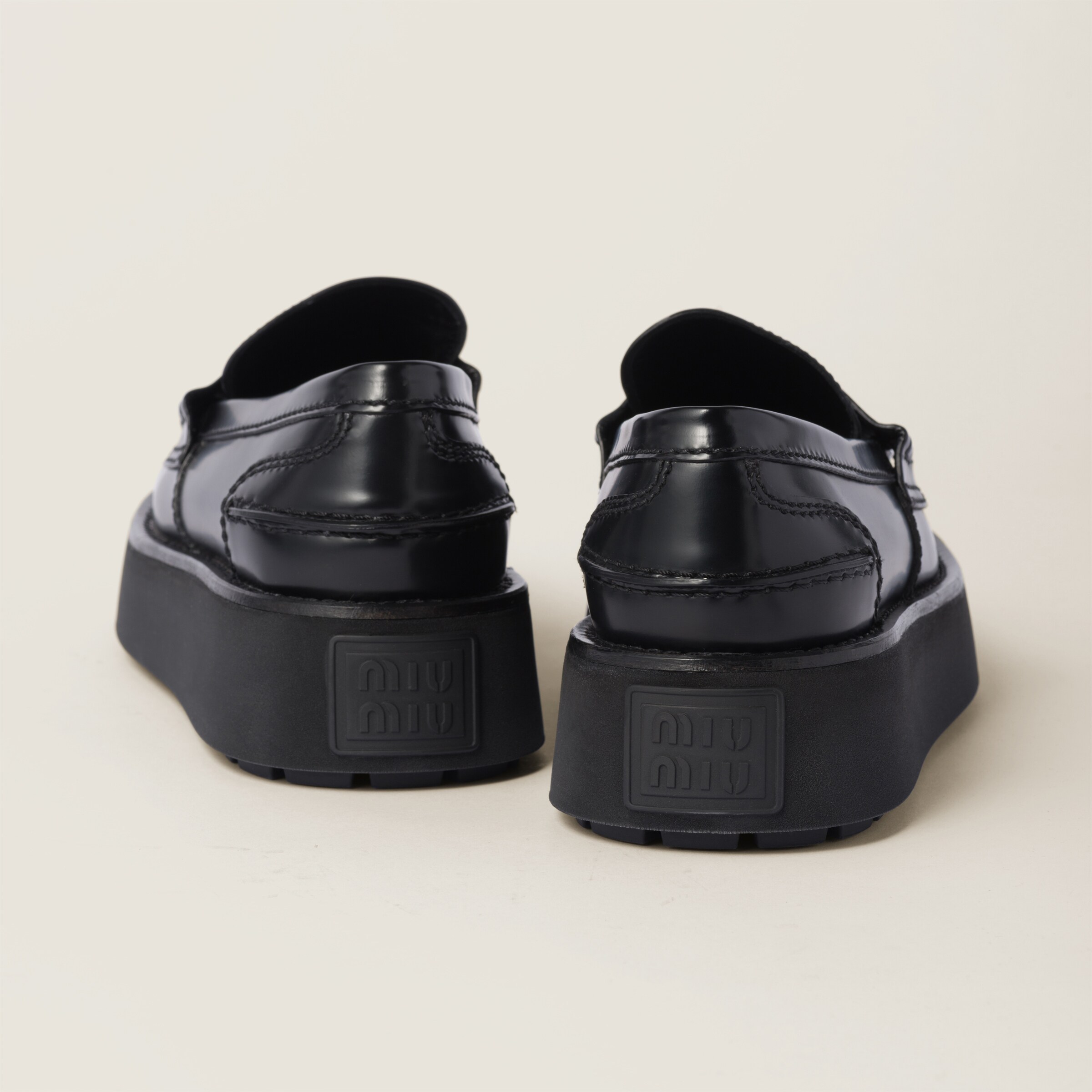 Black Brushed Leather Loafers | Miu Miu