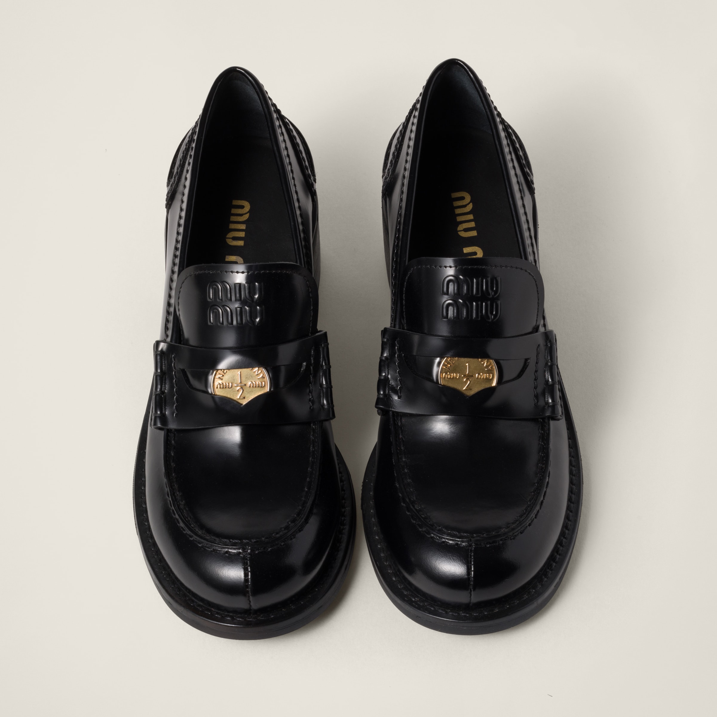 Miu Miu Leather Penny Loafers | Black | FARFETCH
