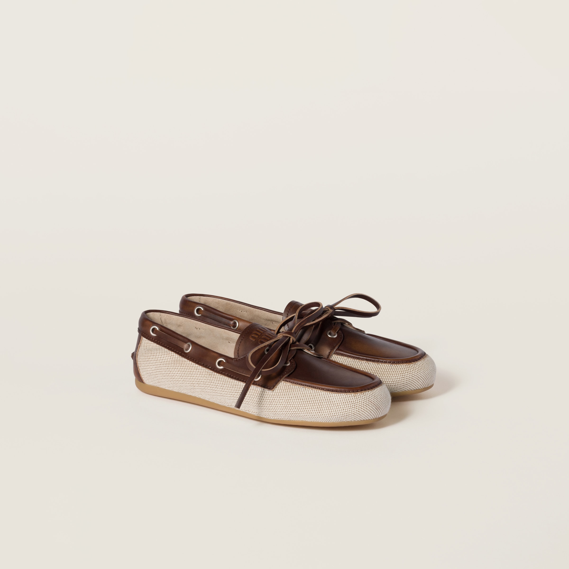 MIU MIU CANVAS AND BLEACHED LEATHER BOAT SHOES