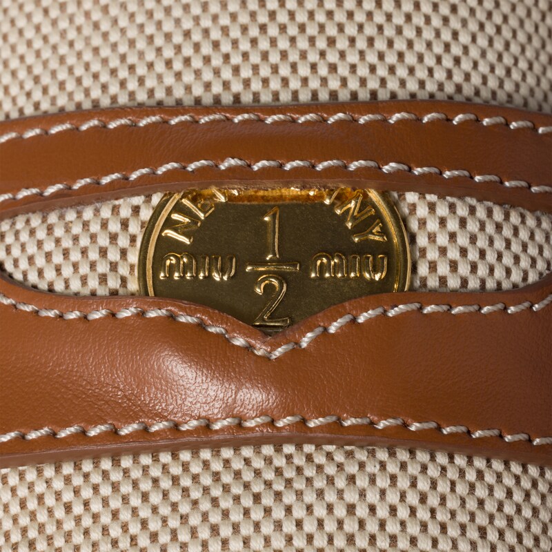 Canvas and leather mules