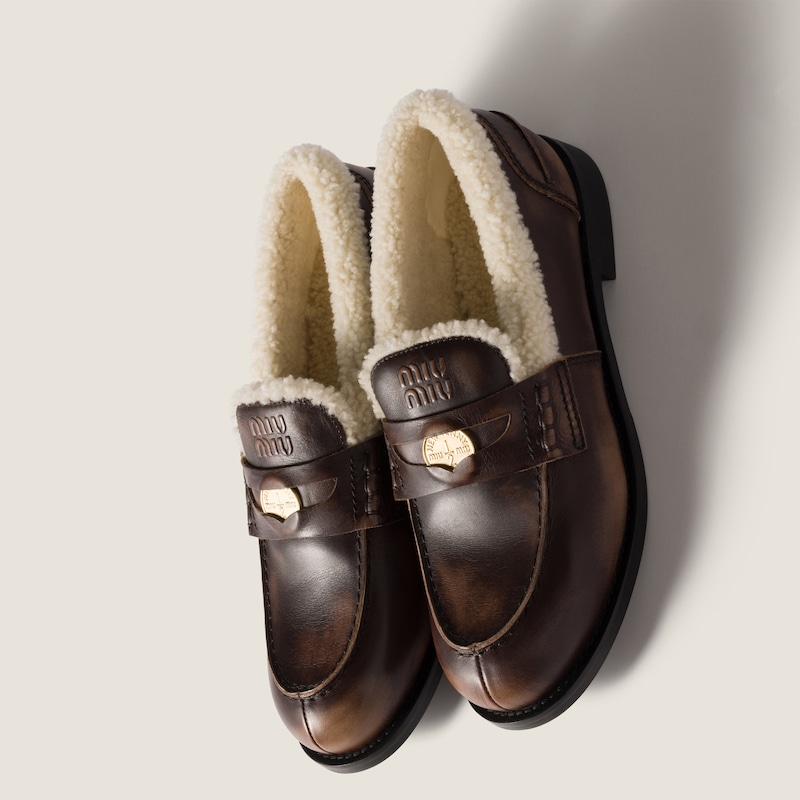 Bleached leather and shearling penny loafers