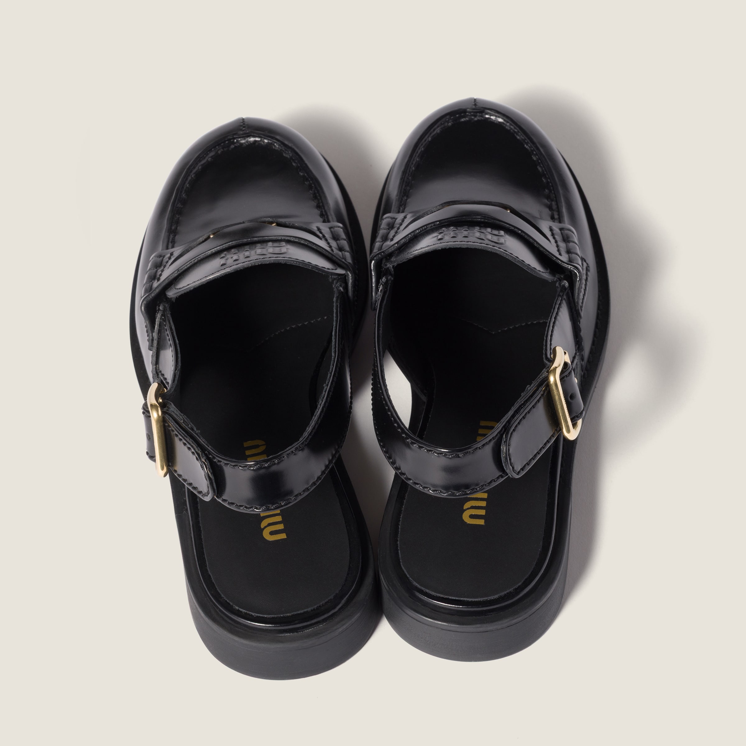 ミュウミュウ Black Brushed Leather Slingback Loafers | Miu Miu - United States