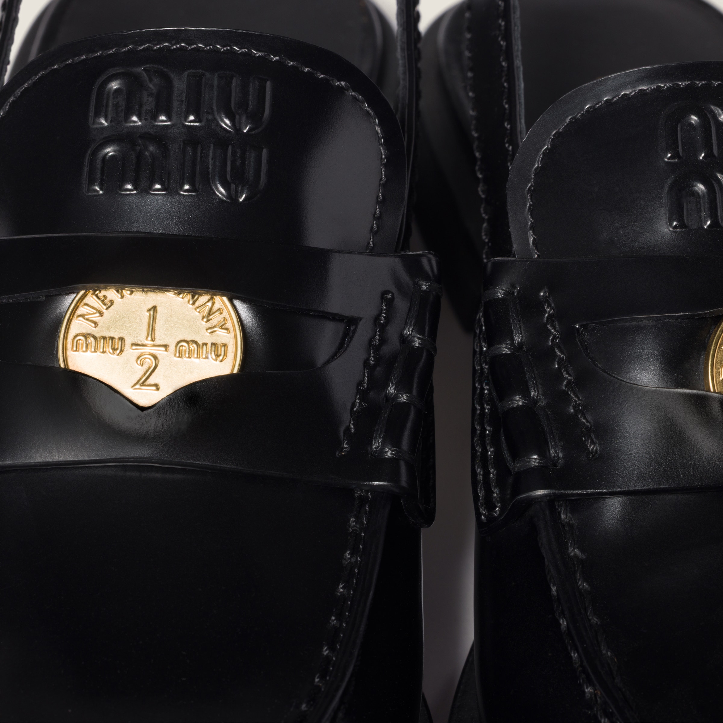 Black Brushed Leather Slingback Loafers | Miu Miu