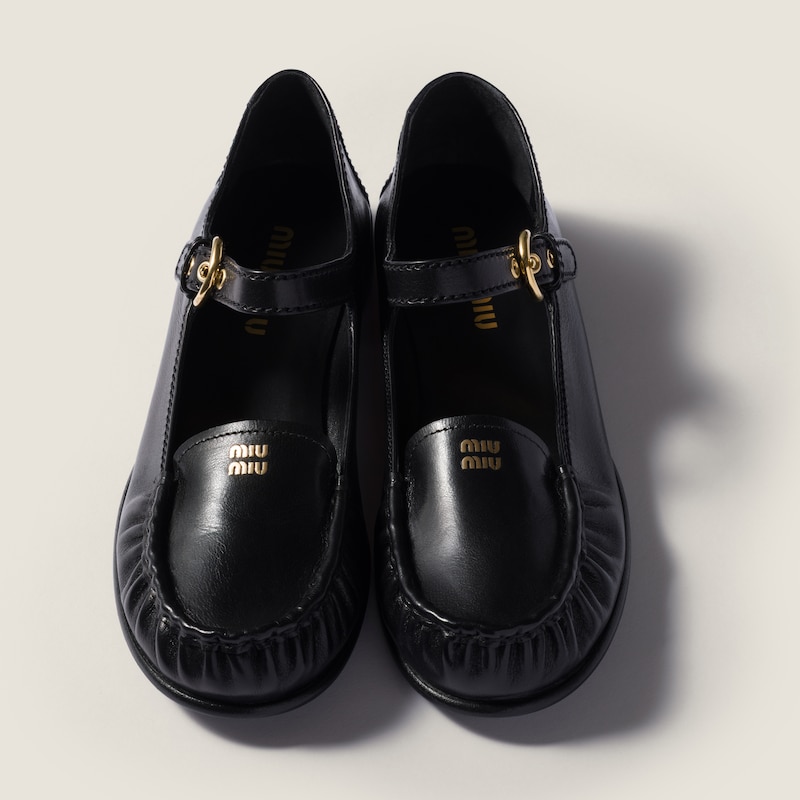 Leather loafers with strap