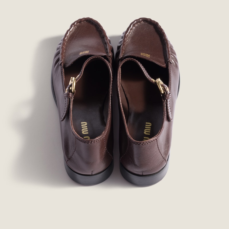 Leather loafers with strap