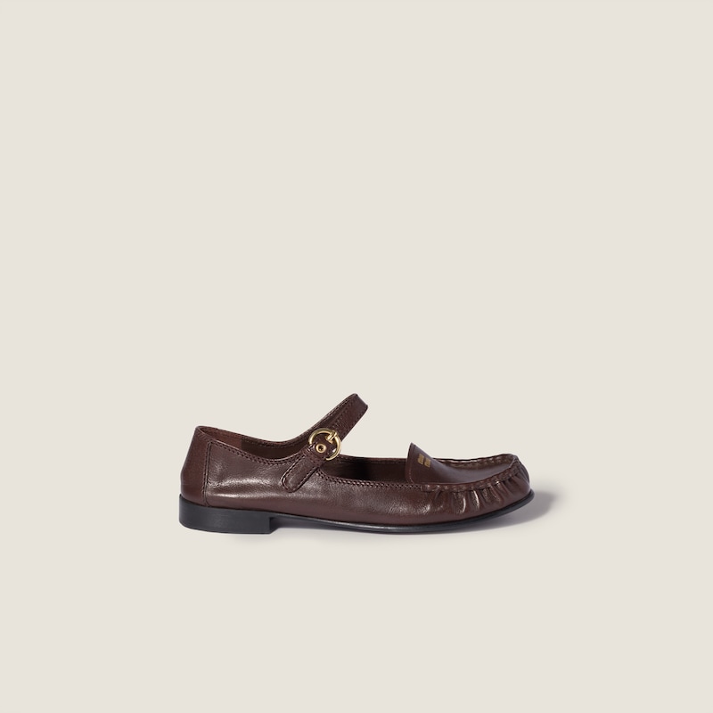 Leather loafers with strap