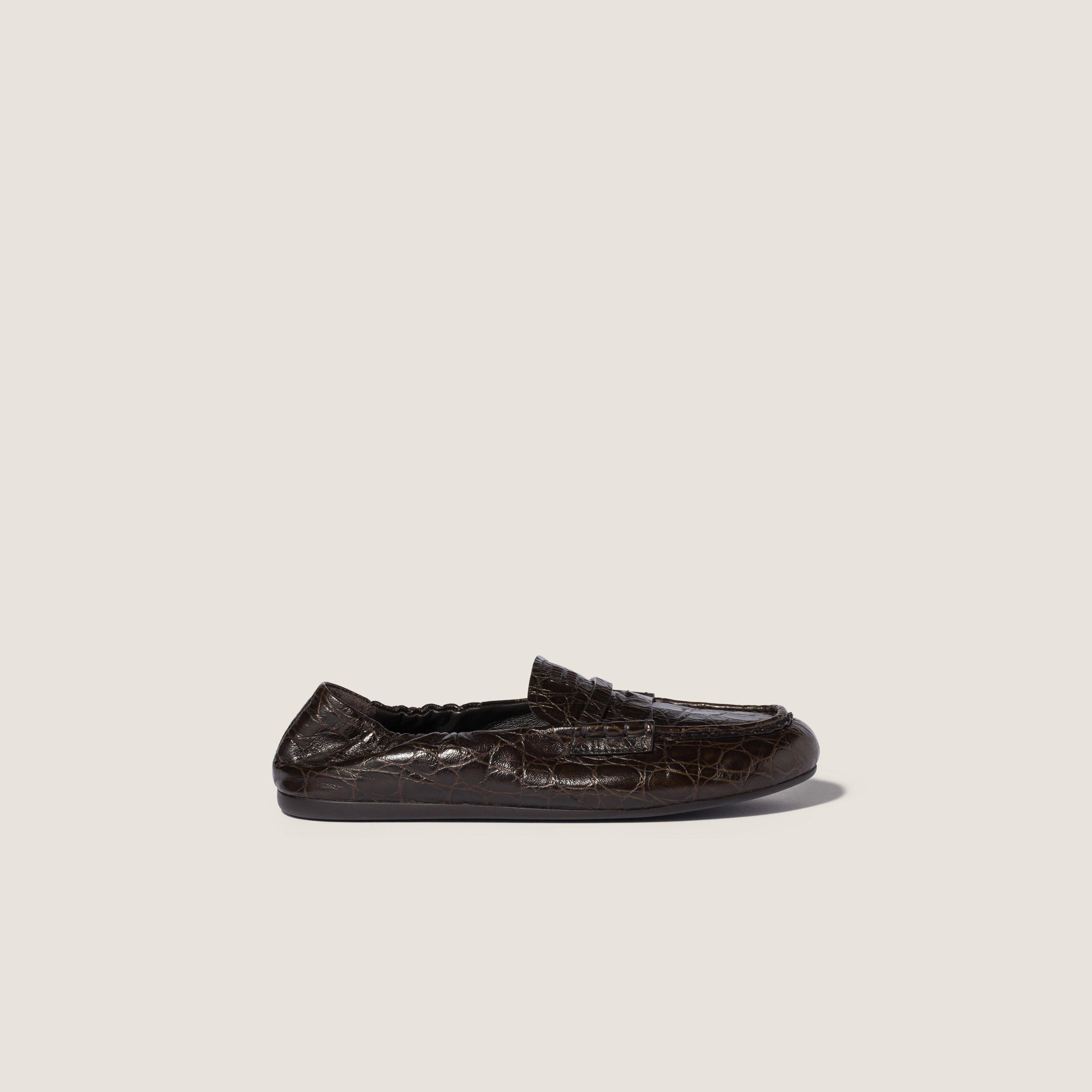 Crocodile embossed calfskin loafers by Miu Miu