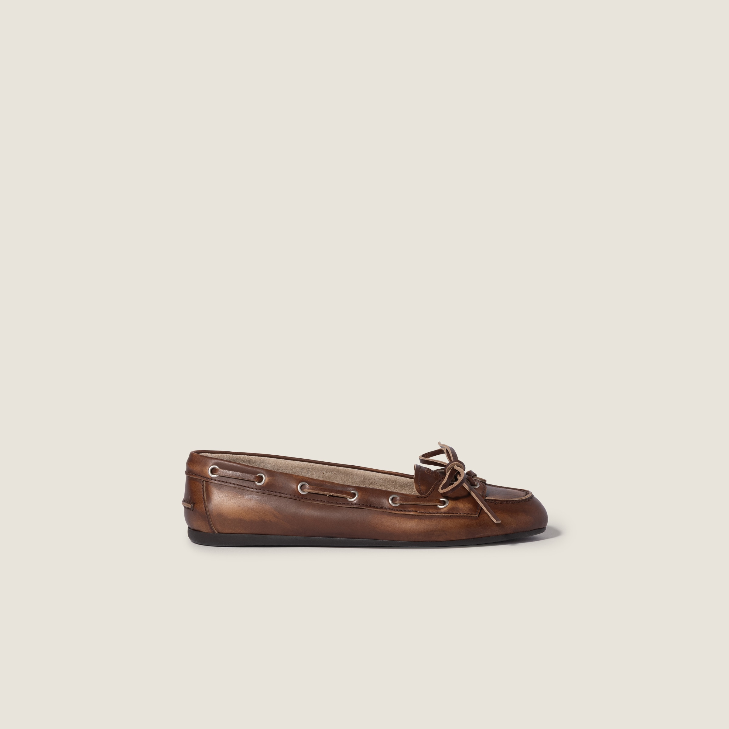 Deck leather loafers by Miu Miu
