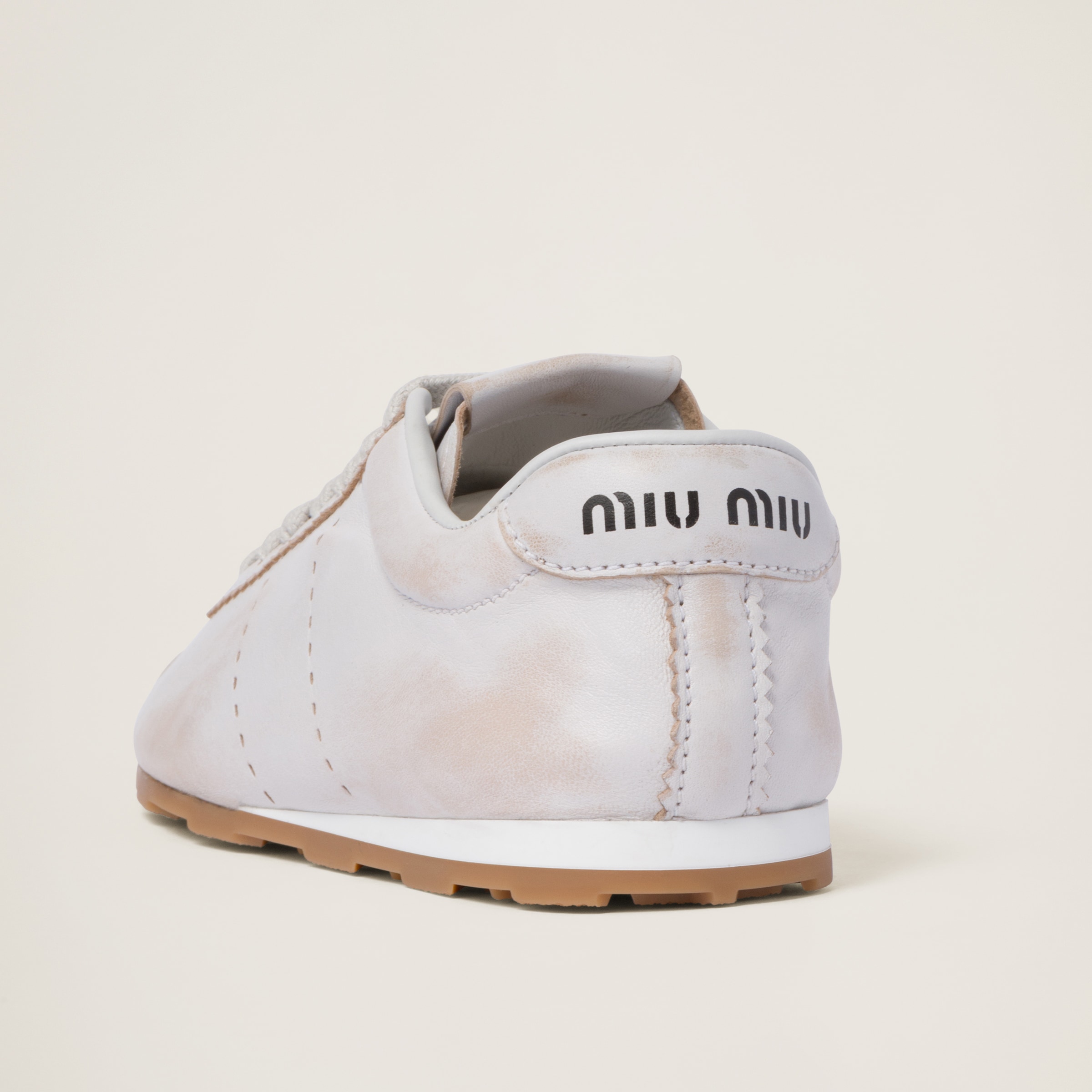 Shop Miumiu Bleached Nappa Leather Sneakers In White